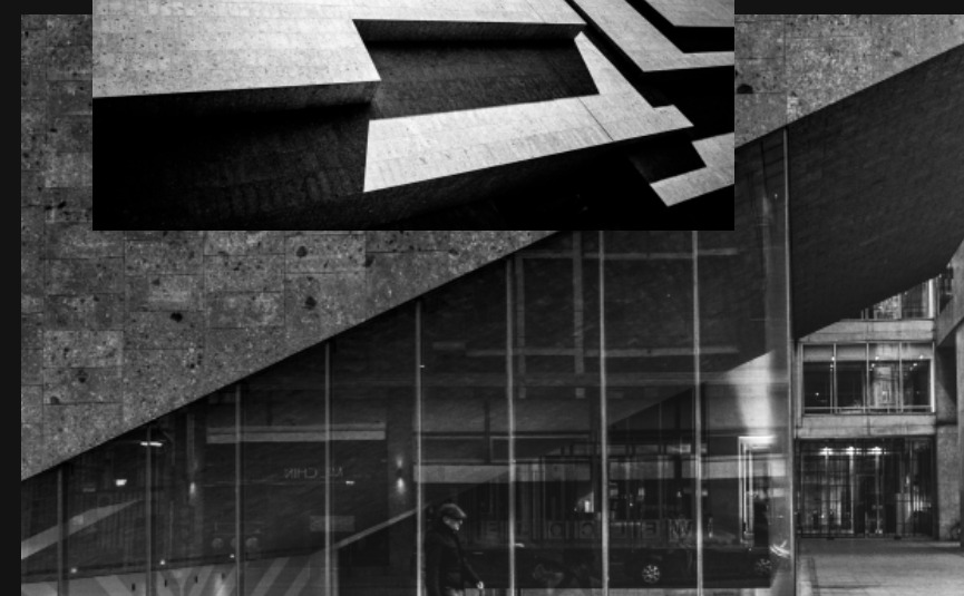 Bocconi campus, glass facade with students walking